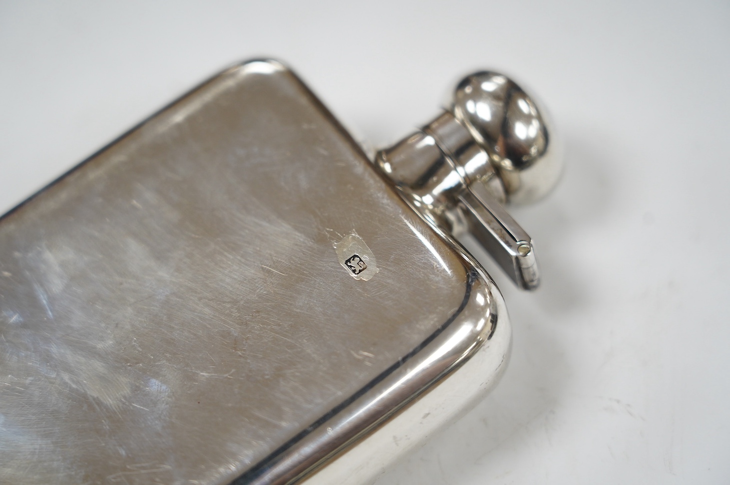 A George VI silver hip flask, Robert Pringle & Sons, London, 1946, 15.2cm, 8oz. Condition - fair